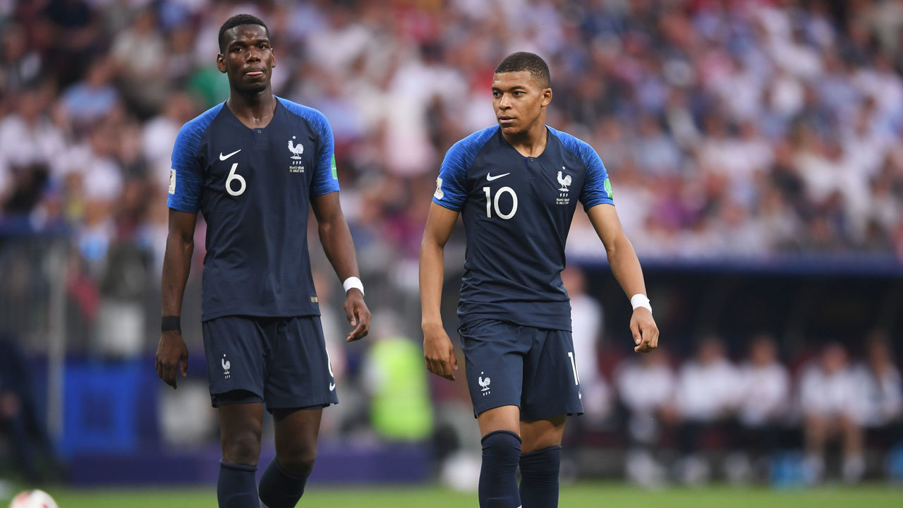 MOSCOW, RUSSIA - JULY 15: Paul Pogba and Kylian Mbappe of France react during the 2018 FIFA World Cup Final between France and Croatia at Luzhniki Stadium on July 15, 2018 in Moscow, Russia.