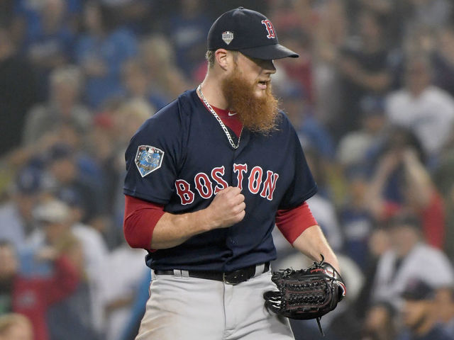 LOS ANGELES, CA - OCTOBER 27: Closing pitcher Craig Kimbrel #46 of the Boston Red Sox pumps his fist after the last out of the ninth inning to defeat the Los Angeles Dodgers 9-6 in Game Four of the 2018 World Series at Dodger Stadium on October 27, 2018 in Los Angeles, California.