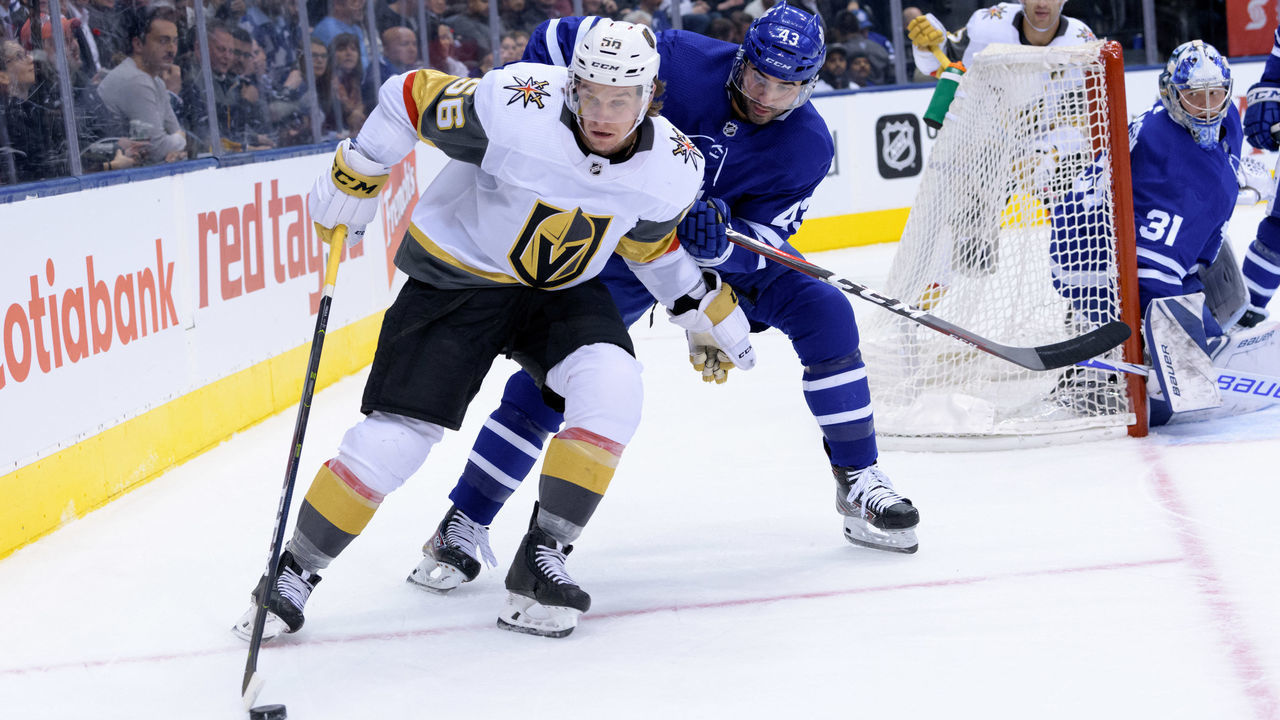 TORONTO, ON - NOVEMBER 06: Vegas Golden Knights Center Erik Haula (56) keeps the puck away from Toronto Maple Leafs Center Nazem Kadri (43) during the NHL regular season game between the Vegas Golden Knights and the Toronto Maple Leafs on November 6, 2018, at Scotiabank Arena in Toronto, ON, Canada.