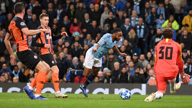 MANCHESTER, ENGLAND - NOVEMBER 07: Raheem Sterling of Manchester City is fouled and a penalty is awarded during the Group F match of the UEFA Champions League between Manchester City and FC Shakhtar Donetsk at Etihad Stadium on November 7, 2018 in Manchester, United Kingdom.