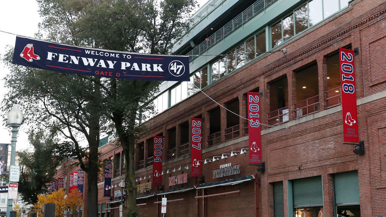 BOSTON, MA - OCTOBER 31: The 2018 championship banner joins the others outside Fenway Park on Yawkey Way before the Boston Red Sox World Series Victory Parade on October 31, 2018 through the streets of Boston, Massachusetts.