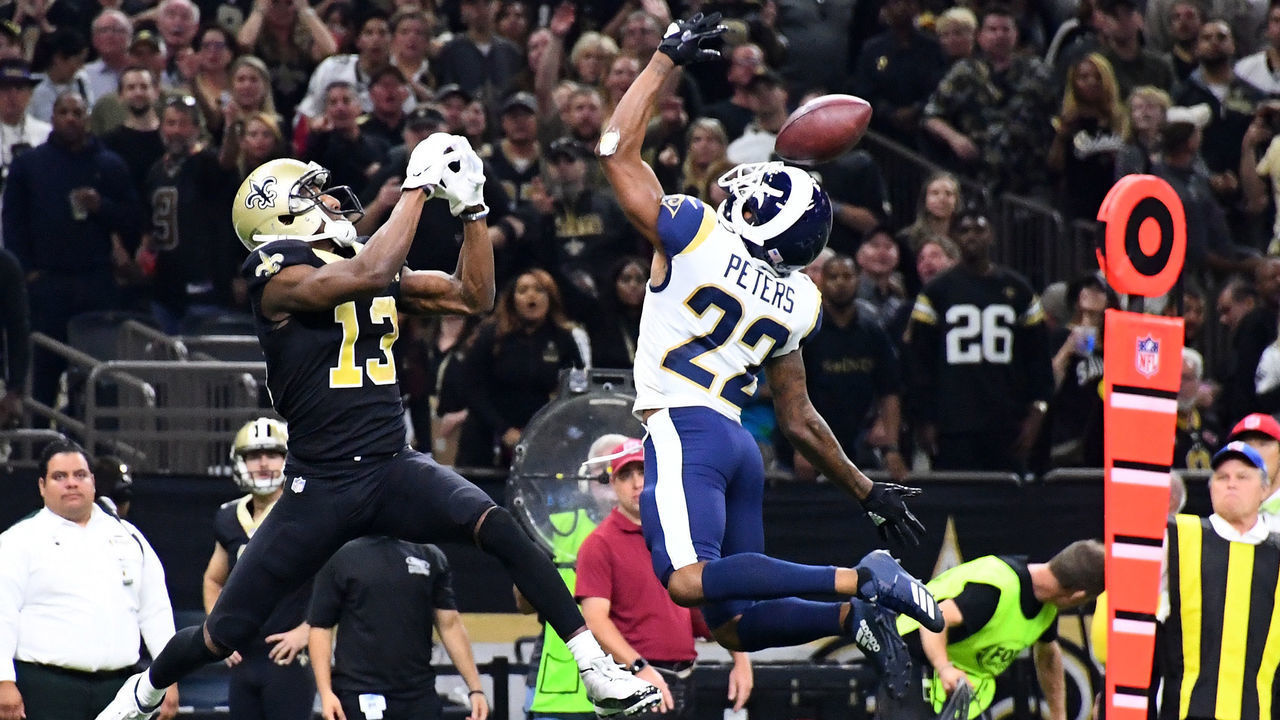 NEW ORLEANS, LA - NOVEMBER 4: Marcus Peters #22 of the Los Angeles Rams breaks up a pass intended for Michael Thomas #13 of the New Orleans Saints at the Mercedes Benz Superdome on November 4, 2018 in New Orleans, Louisiana.