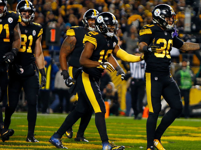 PITTSBURGH, PA - NOVEMBER 08: James Conner #30 of the Pittsburgh Steelers reacts after a 2 yard touchdown run during the first quarter in the game Carolina Panthers at Heinz Field on November 8, 2018 in Pittsburgh, Pennsylvania.