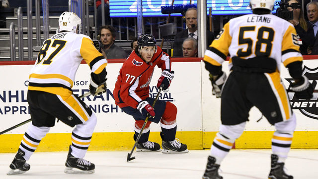 WASHINGTON, DC - NOVEMBER 07: Washington Capitals right wing T.J. Oshie (77) skates against Pittsburgh Penguins center Sidney Crosby (87) in the second period on November 7, 2018, at the Capital One Arena in Washington, D.C. The Washington Capitals defeated the Pittsburgh Penguins, 2-1.