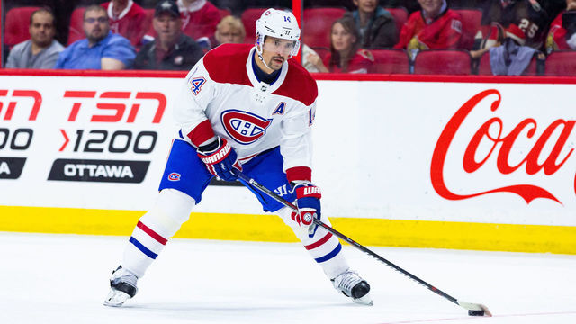 OTTAWA, ON - SEPTEMBER 29: Montreal Canadiens center Tomas Plekanec (14) prepares to shoot the puck during first period National Hockey League preseason action between the Montreal Canadiens and Ottawa Senators on September 29, 2018, at Canadian Tire Centre in Ottawa, ON, Canada.