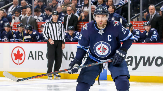 WINNIPEG, MB - OCTOBER 22: Blake Wheeler #26 of the Winnipeg Jets keeps an eye on the play during third period action against the St. Louis Blues at the Bell MTS Place on October 22, 2018 in Winnipeg, Manitoba, Canada. The Jets defeated the Blues 5-4 in overtime.