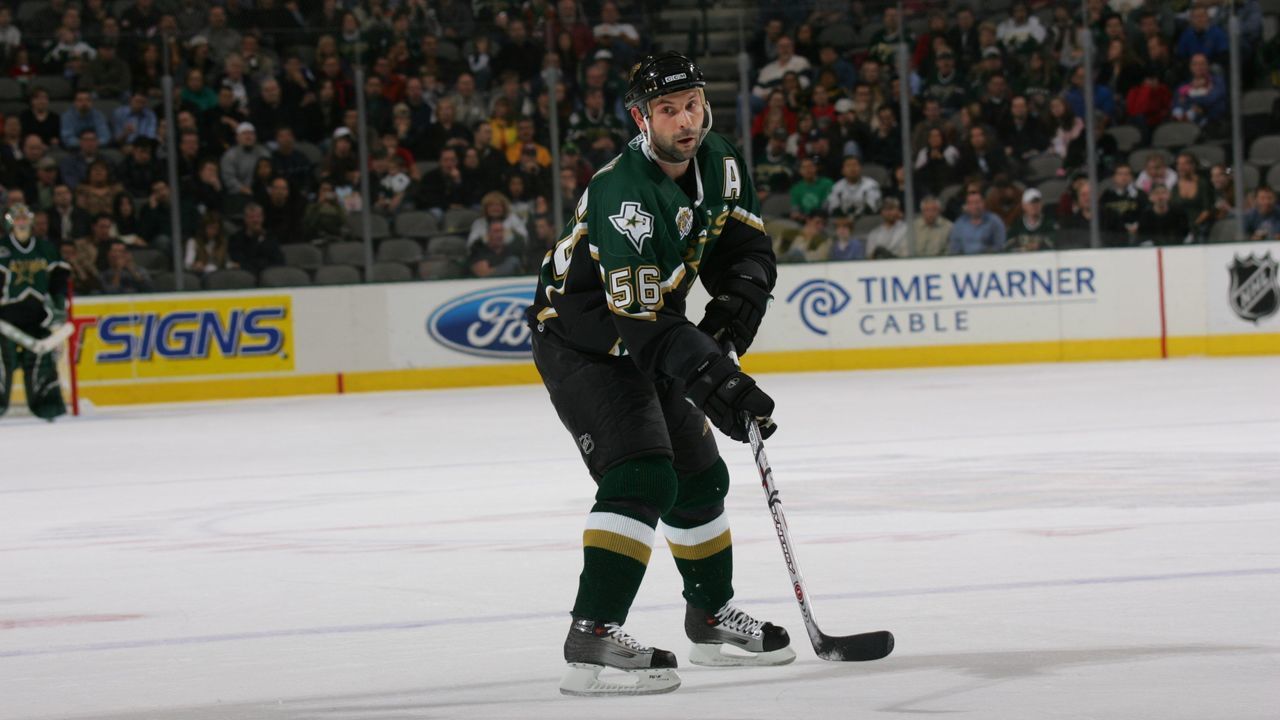 DALLAS - DECEMBER 12: Sergei Zubov #56 of the Dallas Stars skates with the puck against the Columbus Blue Jackets at American Airlines Center on December 12, 2006 in Dallas, Texas. The Blue Jackets won 3-1.