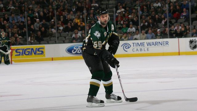 DALLAS - DECEMBER 12: Sergei Zubov #56 of the Dallas Stars skates with the puck against the Columbus Blue Jackets at American Airlines Center on December 12, 2006 in Dallas, Texas. The Blue Jackets won 3-1.