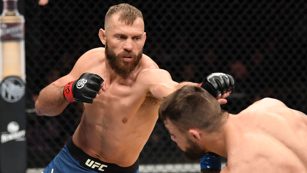 DENVER, CO - NOVEMBER 10: (L-R) Donald Cerrone punches Mike Perry in their welterweight bout during the UFC Fight Night event inside Pepsi Center on November 10, 2018 in Denver, Colorado.