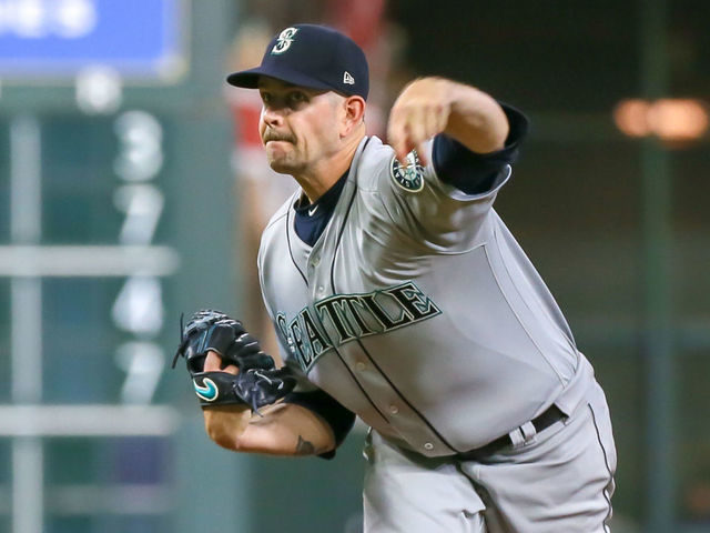 HOUSTON, TX - AUGUST 09: Seattle Mariners starting pitcher James Paxton (65) pitches to Houston Astros first baseman Tyler White (13) in the bottom of the second inning during the baseball game between the Seattle Mariners and Houston Astros on August 9, 2018 at Minute Maid Park in Houston, Texas.