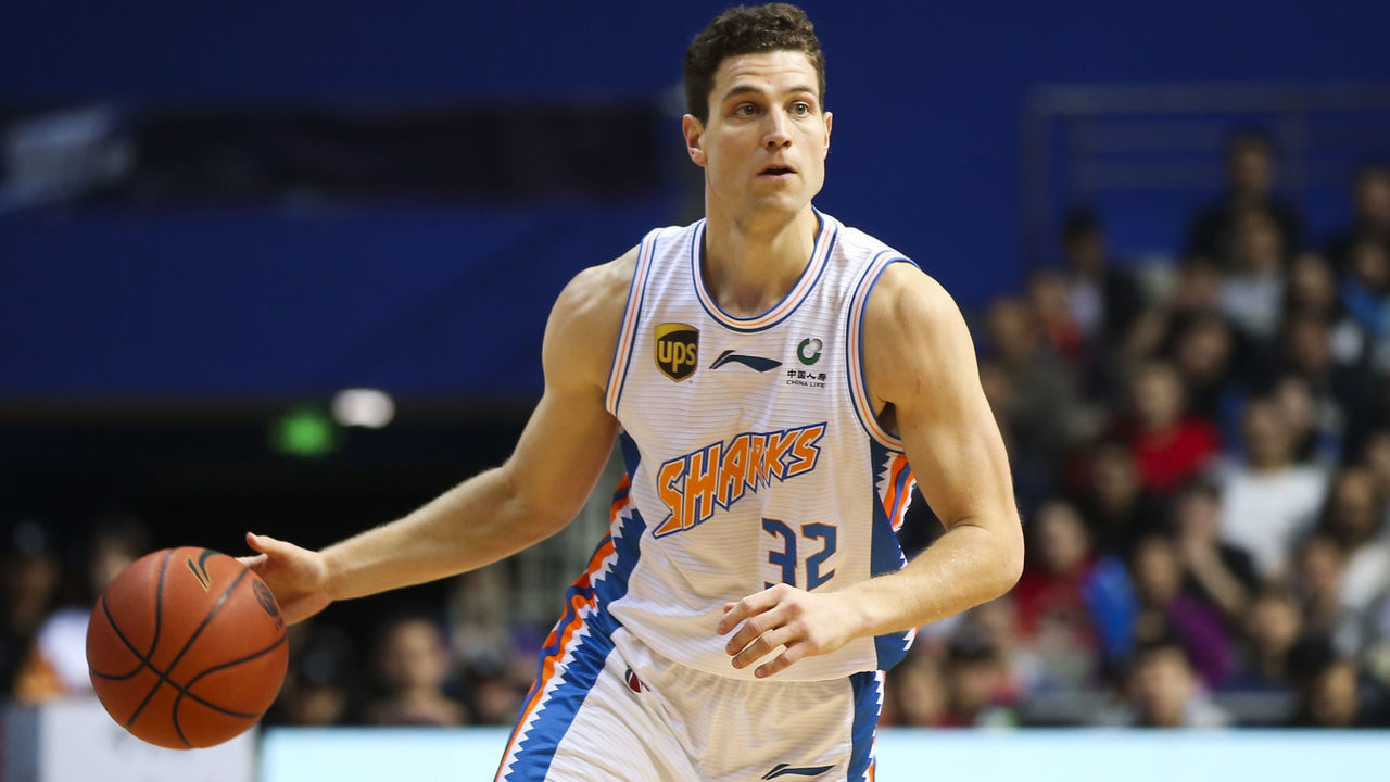 SHANGHAI, CHINA - NOVEMBER 06: Jimmer Fredette #32 of Shanghai Bilibili Sharks drives the ball during the 2018/2019 Chinese Basketball Association (CBA) League eighth round match between Shanghai Bilibili Sharks and Beijing Shougang Ducks at Pudong Yuanshen Gymnasium on November 6, 2018 in Shanghai, China.