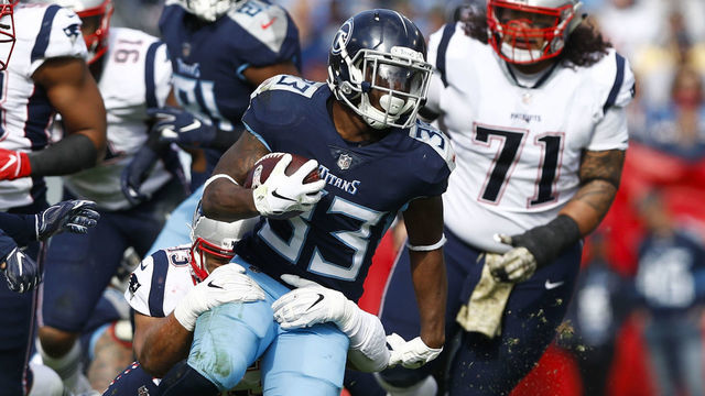 NASHVILLE, TN - NOVEMBER 11: Dion Lewis #33 of the Tennessee Titans runs with the ball during the first quarter against the New England Patriots at Nissan Stadium on November 11, 2018 in Nashville, Tennessee.