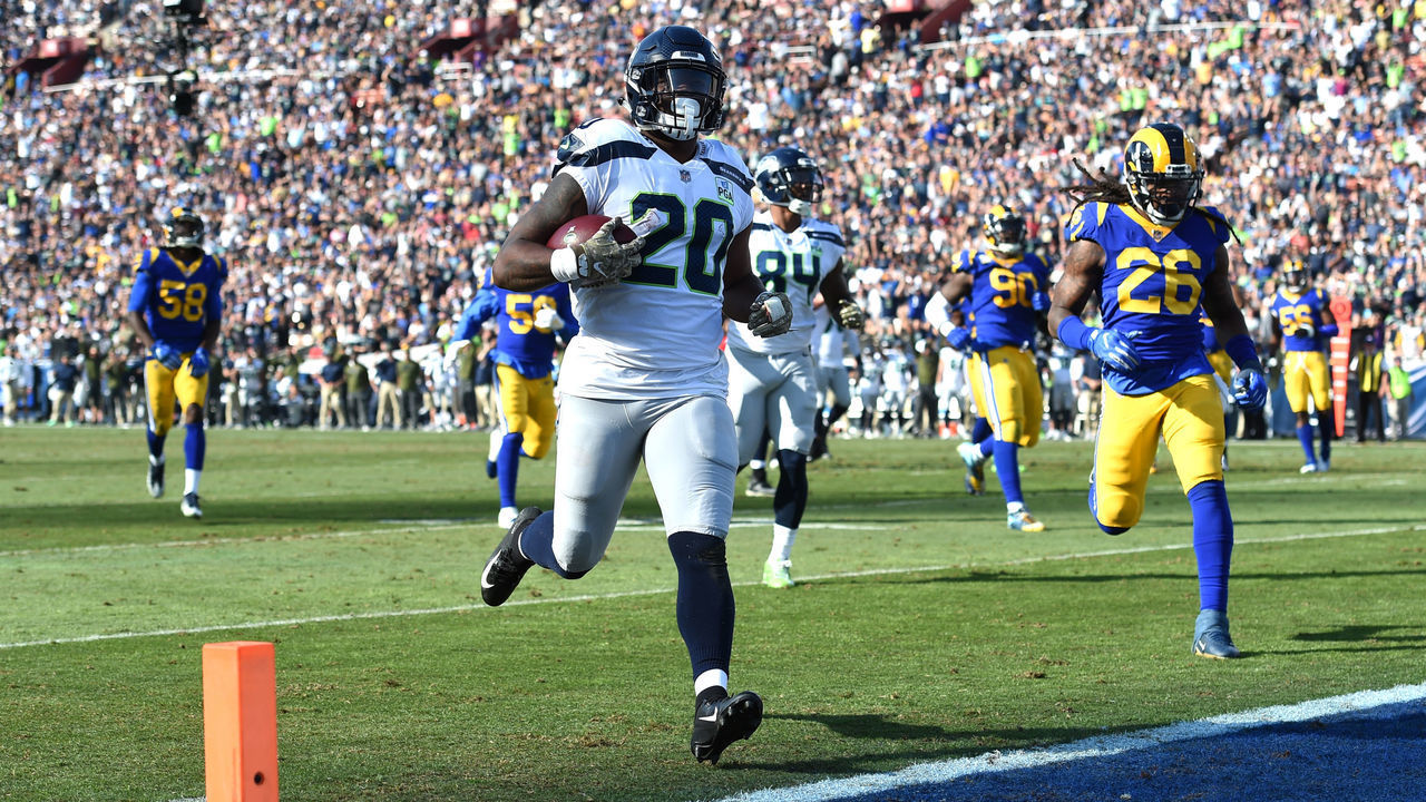 Seattle Seahawks Running Back Rashaad Penny (20) runs into the endzone for a touchdown during an NFL game between the Seattle Seahawks and the Los Angeles Rams on November 11, 2018, at the Los Angeles Memorial Coliseum in Los Angeles, CA.