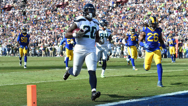 Seattle Seahawks Running Back Rashaad Penny (20) runs into the endzone for a touchdown during an NFL game between the Seattle Seahawks and the Los Angeles Rams on November 11, 2018, at the Los Angeles Memorial Coliseum in Los Angeles, CA.