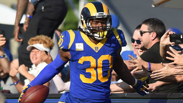 Los Angeles Rams Running Back Todd Gurley (30) celebrates with the fans after running for a touchdown during an NFL game between the Seattle Seahawks and the Los Angeles Rams on November 11, 2018, at the Los Angeles Memorial Coliseum in Los Angeles, CA.