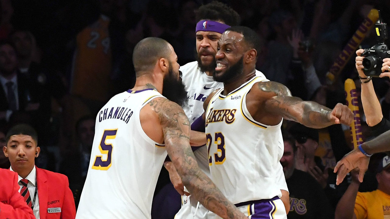 LOS ANGELES, CALIFORNIA - NOVEMBER 11: LeBron James #23 of the Los Angeles Lakers celebrates with Tyson Chandler #5 of the Los Angeles Lakers after he blocked the final shot of the game by Trae Young #11 of the Atlanta Hawks to win the the game at Staples Center on November 11, 2018 in Los Angeles, California.
