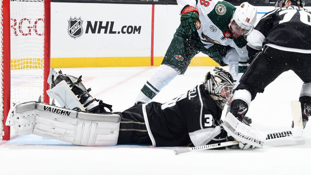 LOS ANGELES, CA - NOVEMBER 8: Goaltender Jack Campbell #36 of the Los Angeles Kings makes a save as Tanner Pearson #70 of the Los Angeles Kings holds back Jordan Greenway #18 of the Minnesota Wild during the second period of the game at STAPLES Center on November 8, 2018 in Los Angeles, California.