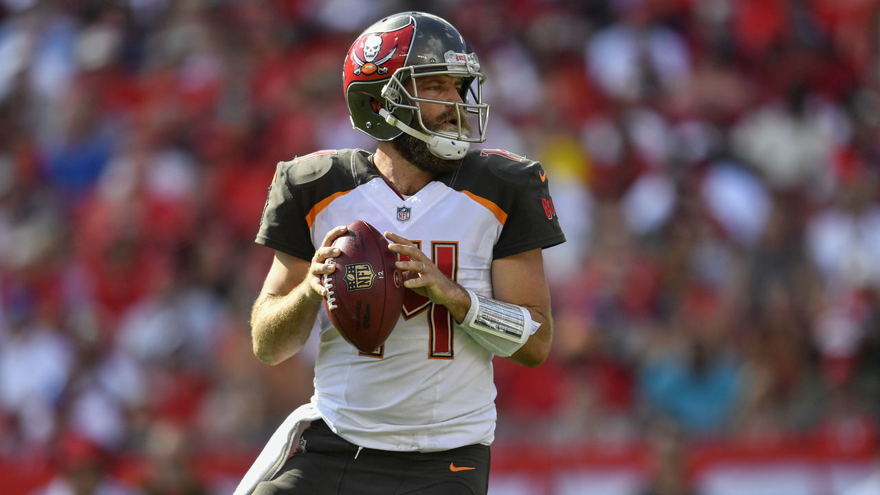 TAMPA, FL - NOVEMBER 11: Tampa Bay Buccaneers quarterback Ryan Fitzpatrick (14) in the pocket during the first half of an NFL game between the Washington Redskins and the Tampa Bay Bucs on November 11, 2018, at Raymond James Stadium in Tampa, FL.