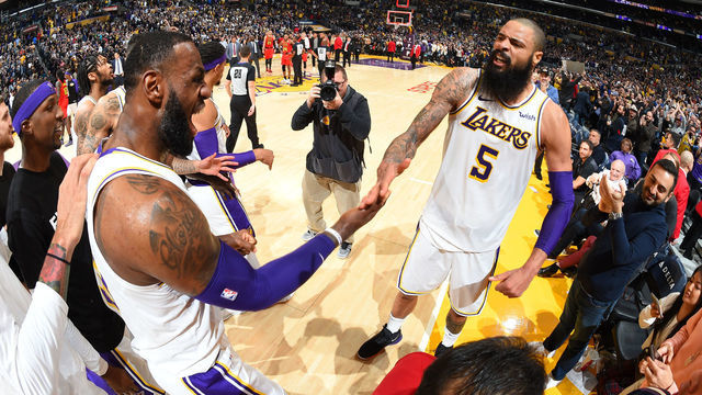 LOS ANGELES, CA - NOVEMBER 11: Tyson Chandler #5 of the Los Angeles Lakers celebrates to a Laker's win with LeBron James #23 of the Los Angeles Lakers after the game against the Atlanta Hawks on November 11, 2018 at STAPLES Center in Los Angeles, California. NOTE TO USER: User expressly acknowledges and agrees that, by downloading and/or using this Photograph, user is consenting to the terms and conditions of the Getty Images License Agreement. Mandatory Copyright Notice: Copyright 2018 NBAE
