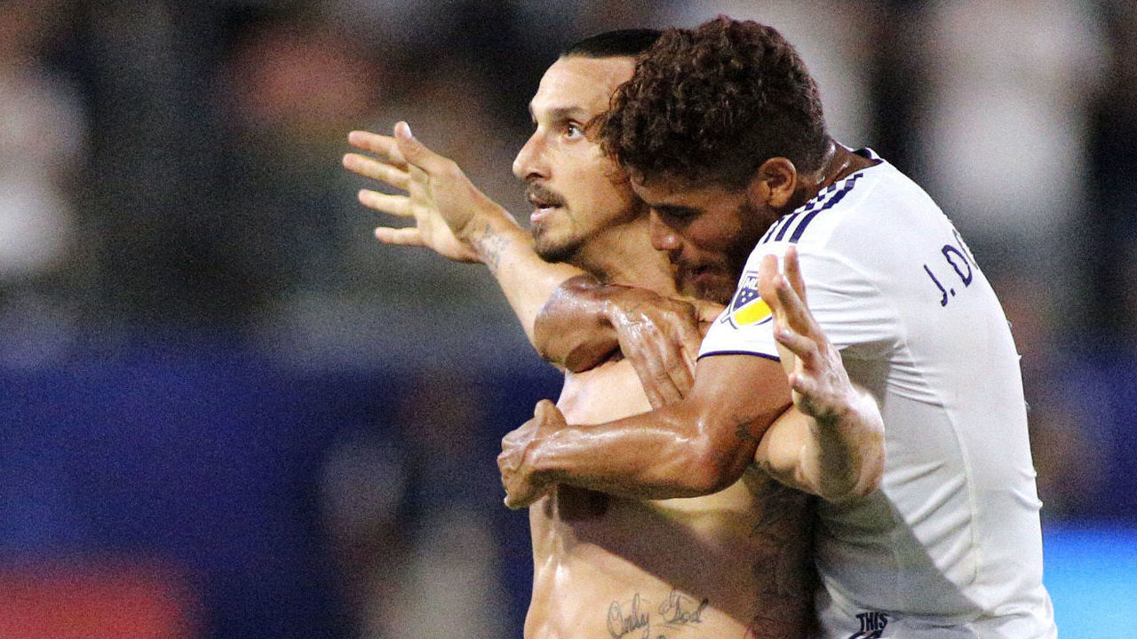 CARSON, CA - JULY 29: Zlatan Ibrahimovic #9 and Jonathan Dos Santos #8 of the Los Angeles Galaxy celebrate Ibrahimovic's third goal of the game at StubHub Center on July 29, 2018 in Carson, California.