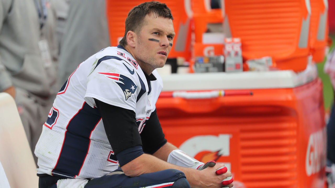 NASHVILLE, TN - NOVEMBER 11: New England Patriots Tom Brady sits on the bench after getting pulled with more than 7 minutes left in the game against the Tennessee Titans during fourth quarter action at Nissan Field in Nashville on Nov. 11, 2018.
