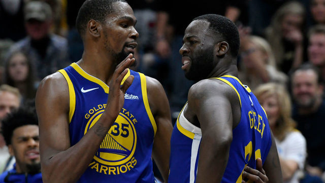 SALT LAKE CITY, UT - OCTOBER 19: Kevin Durant #35 of the Golden State Warriors tries to calm down teammate Draymond Green #23 after a foul in the second half of a NBA game against the Utah Jazz at Vivint Smart Home Arena on October 19, 2018 in Salt Lake City, Utah.