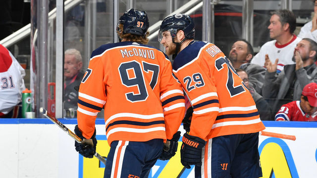 EDMONTON, AB - NOVEMBER 13: Leon Draisaitl #29 and Connor McDavid #97 of the Edmonton Oilers discuss the play during the game against the Montreal Canadiens on November 13, 2018 at Rogers Place in Edmonton, Alberta, Canada.