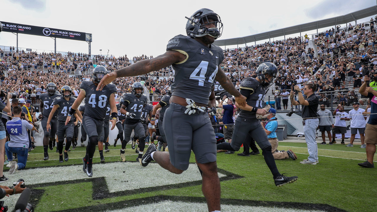 ORLANDO, FL - NOVEMBER 10: Ucf takes the field before the football game between the visiting NAVY Midshipmen and the UCF Knights on November 10, 2018, at Spectrum Stadium in Orlando FL.