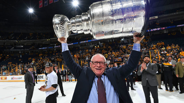 NASHVILLE, TN - JUNE 11: General Manager Jim Rutherford of the Pittsburgh Penguins lifts the Stanley Cup after Game Six of the 2017 NHL Stanley Cup Final at the Bridgestone Arena on June 11, 2017 in Nashville, Tennessee. The Penguins defeated the Predators 2-0. The Pittsburgh Penguins win the Stanley Cup Final series against the Nashville Predators 4-2.