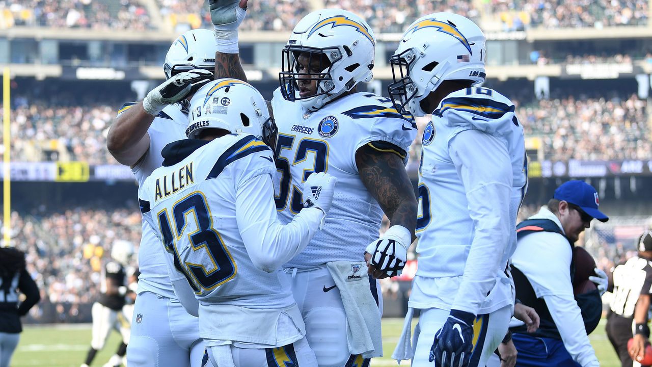 OAKLAND, CA - NOVEMBER 11: Keenan Allen #13 of the Los Angeles Chargers celebrates after an 11-yard touchdown against the Oakland Raiders during their NFL game at Oakland-Alameda County Coliseum on November 11, 2018 in Oakland, California.