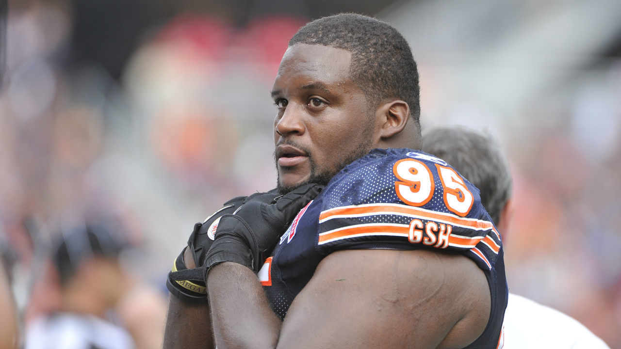CHICAGO, IL - SEPTEMBER 11: Defensive tackle Anthony Adams #95 of the Chicago Bears stands on the sideline during the second quarter against the Atlanta Falcons at Soldier Field on September 11, 2011 in Chicago, Illinois. The Bears defeated the Falcons 30-12.