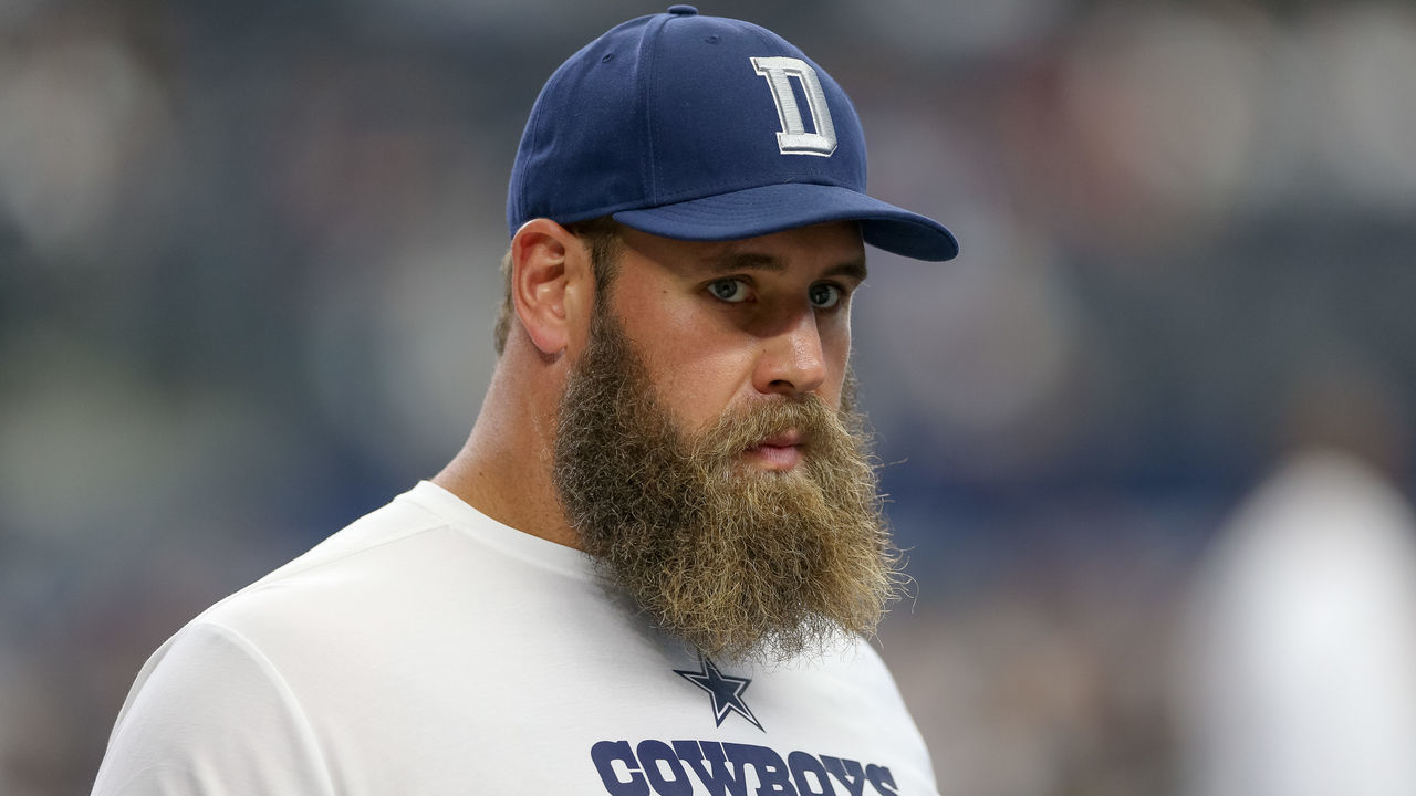 ARLINGTON, TX - OCTOBER 14: Dallas Cowboys Center Travis Frederick watches warm-up while on IR prior to the game between the Jacksonville Jaguars and Dallas Cowboys on October 14, 2018 at AT&T Stadium in Arlington, TX.