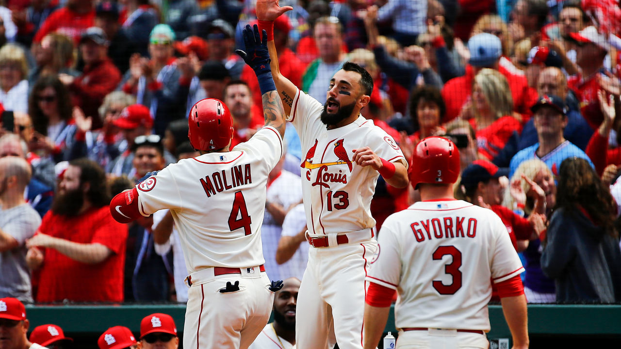 ST. LOUIS, MO - SEPTEMBER 22: Yadier Molina #4 of the St. Louis Cardinals is congratulated by Matt Carpenter #13 of the St. Louis Cardinals after hitting a two-run home run against the San Francisco Giants in the seventh inning at Busch Stadium on September 22, 2018 in St. Louis, Missouri.