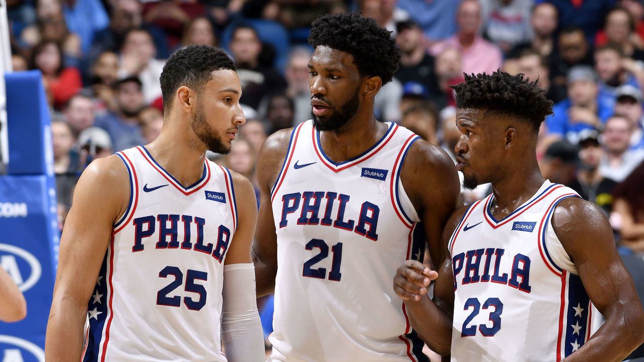 ORLANDO, FL - NOVEMBER 14: Ben Simmons #25, Joel Embiid #21, and Jimmy Butler #23 of the Philadelphia 76ers talk during the game against the Orlando Magic on November 14, 2018 at Amway Center in Orlando, Florida. NOTE TO USER: User expressly acknowledges and agrees that, by downloading and/or using this photograph, user is consenting to the terms and conditions of the Getty Images License Agreement. Mandatory Copyright Notice: Copyright 2018 NBAE