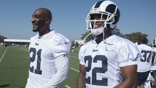 IRVINE, CA - JULY 26: New cornerbacks Aqib Talib, left, and Marcus Peters talk on the sidelines during the Los Angeles Rams' first practice for their 2018 training camp at UC Irvine in Irvine on Thursday, July 26, 2018.