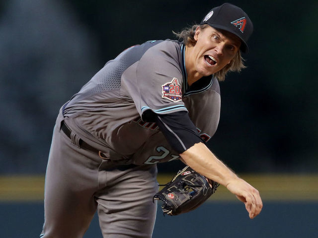 DENVER, CO - SEPTEMBER 11: Starting pitcher Zack Greinke #21 of the Arizona Diamondbacks throws in the first inning against the Colorado Rockies at Coors Field on September 11, 2018 in Denver, Colorado.