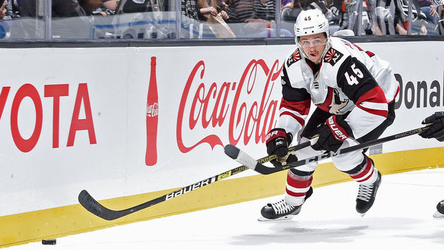 LOS ANGELES, CA - SEPTEMBER 18: Josh Archibald #45 of the Arizona Coyotes battles for the puck against Alex Lintuniemi #45 of the Los Angeles Kings during a preseason game at STAPLES Center on September 18, 2018 in Los Angeles, California.