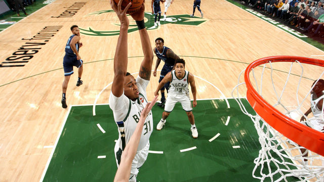 MILWAUKEE, WI - NOVEMBER 14: John Henson #31 of the Milwaukee Bucks shoots the ball against the Memphis Grizzlies on November 14, 2018 at the Fiserv Forum in Milwaukee, Wisconsin. Mandatory Copyright Notice: Copyright 2018 NBAE