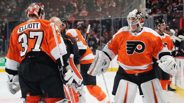 PHILADELPHIA, PA - NOVEMBER 15: Brian Elliott #37 of the Philadelphia Flyers leaves the ice after a third period injury against the New Jersey Devils on November 15, 2018 at the Wells Fargo Center in Philadelphia, Pennsylvania. Calvin Pickard #33 entered the game in relief. The Devils went on to defeat the Flyers 3-0.