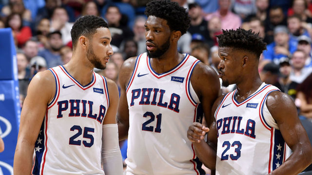 ORLANDO, FL - NOVEMBER 14: Ben Simmons #25, Joel Embiid #21, and Jimmy Butler #23 of the Philadelphia 76ers talk during the game against the Orlando Magic on November 14, 2018 at Amway Center in Orlando, Florida. NOTE TO USER: User expressly acknowledges and agrees that, by downloading and/or using this photograph, user is consenting to the terms and conditions of the Getty Images License Agreement. Mandatory Copyright Notice: Copyright 2018 NBAE
