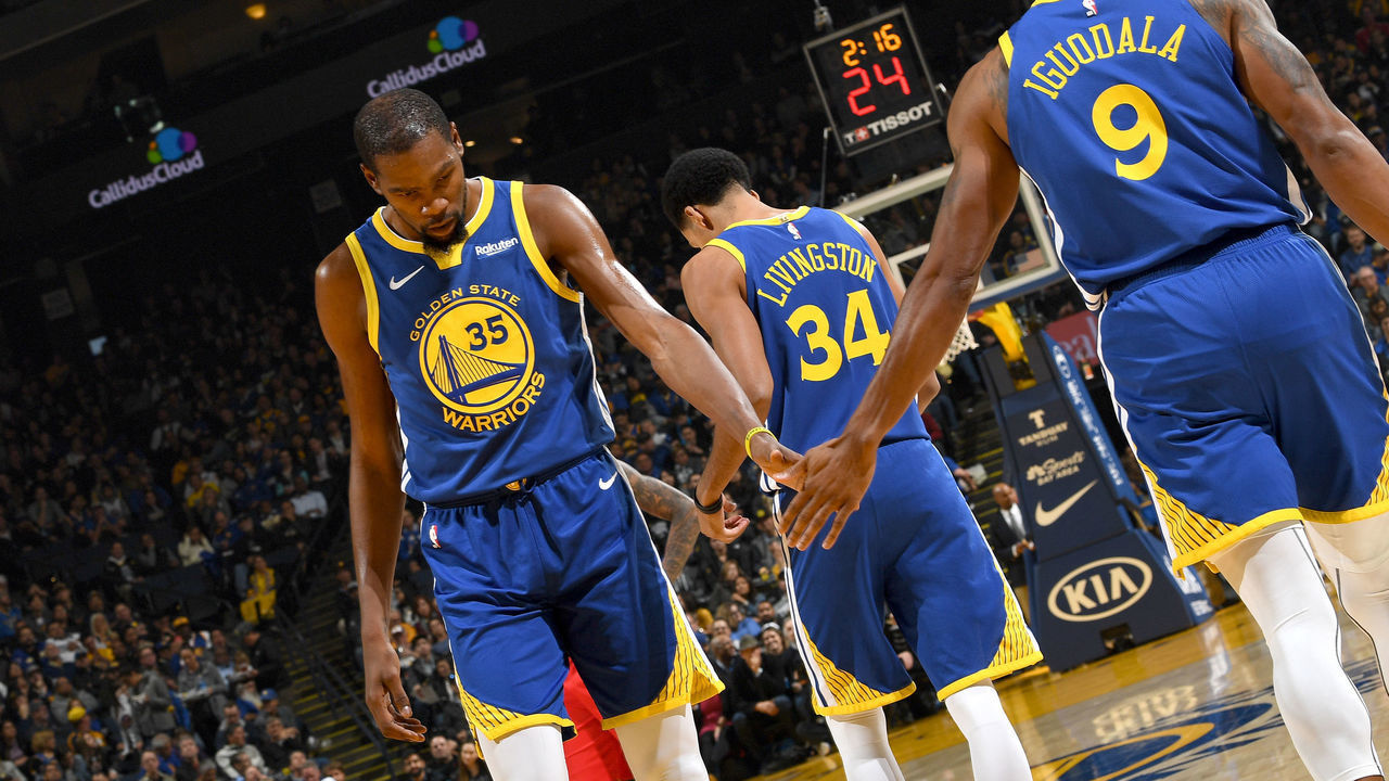 OAKLAND, CA - NOVEMBER 13: Kevin Durant #35 of the Golden State Warriors hi fives Andre Iguodala #9 of the Golden State Warriors on November 13, 2018 at ORACLE Arena in Oakland, California. NOTE TO USER: User expressly acknowledges and agrees that, by downloading and or using this photograph, user is consenting to the terms and conditions of Getty Images License Agreement. Mandatory Copyright Notice: Copyright 2018 NBAE