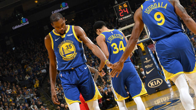 OAKLAND, CA - NOVEMBER 13: Kevin Durant #35 of the Golden State Warriors hi fives Andre Iguodala #9 of the Golden State Warriors on November 13, 2018 at ORACLE Arena in Oakland, California. NOTE TO USER: User expressly acknowledges and agrees that, by downloading and or using this photograph, user is consenting to the terms and conditions of Getty Images License Agreement. Mandatory Copyright Notice: Copyright 2018 NBAE