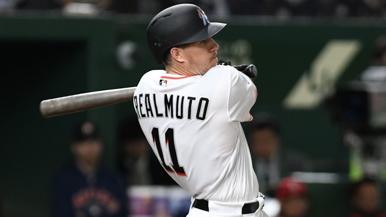 J.T. Realmuto of the Miami Marlins hits a three-run homer during the eighth inning of the second exhibition baseball game between the US Major League Baseball All Star team and the Japanese national team at the Tokyo Dome in Tokyo on November 10, 2018.