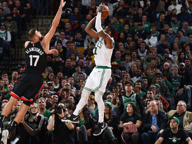 BOSTON, MA - NOVEMBER 16: Kyrie Irving #11 of the Boston Celtics shoots the ball against the Toronto Raptors on November 16, 2018 at the TD Garden in Boston, Massachusetts. Mandatory Copyright Notice: Copyright 2018 NBAE