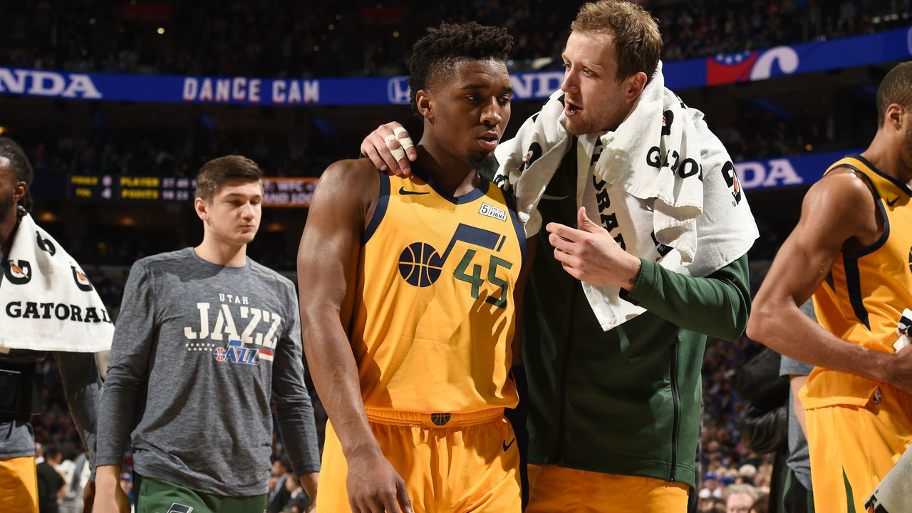 PHILADELPHIA, PA - NOVEMBER 16: Donovan Mitchell #45 and Joe Ingles #2 of the Utah Jazz talk during the game against the Philadelphia 76ers on November 16, 2018 at the Wells Fargo Center in Philadelphia, Pennsylvania. NOTE TO USER: User expressly acknowledges and agrees that, by downloading and/or using this photograph, user is consenting to the terms and conditions of the Getty Images License Agreement. Mandatory Copyright Notice: Copyright 2018 NBAE