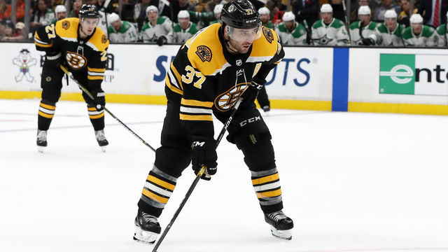 BOSTON, MA - NOVEMBER 05: Boston Bruins center Patrice Bergeron (37) sets up in the shooters spot on a face off during a game between the Boston Bruins and the Dallas Stars on November 5, 2018, at TD Garden in Boston, Massachusetts.