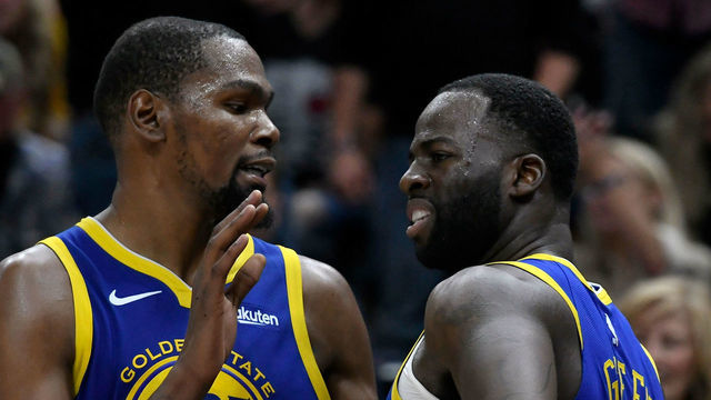 SALT LAKE CITY, UT - OCTOBER 19: Kevin Durant #35 of the Golden State Warriors tries to calm down teammate Draymond Green #23 after a foul in the second half of a NBA game against the Utah Jazz at Vivint Smart Home Arena on October 19, 2018 in Salt Lake City, Utah.