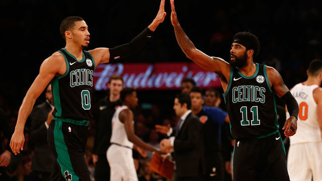 NEW YORK, NY - OCTOBER 20: Kyrie Irving #11 and Jayson Tatum #0 of the Boston Celtics in action against the New York Knicks at Madison Square Garden on October 20, 2018 in New York City. Boston Celtics defeated the New York Knicks 103-101.