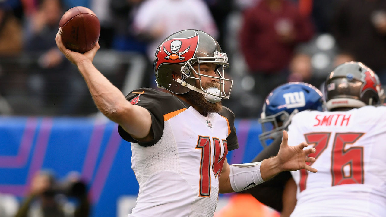 EAST RUTHERFORD, NJ - NOVEMBER 18: Quarterback Ryan Fitzpatrick #14 of the Tampa Bay Buccaneers throws a pass against the New York Giants in the first half at MetLife Stadium on November 18, 2018 in East Rutherford, New Jersey.