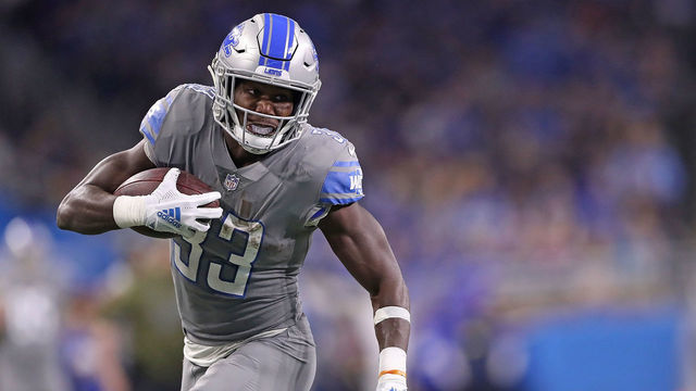 DETROIT, MI - NOVEMBER 18: Kerryon Johnson #33 of the Detroit Lions runs for a first down during the second quarter of the game against the Carolina Panthers at Ford Field on November 18, 2018 in Detroit, Michigan